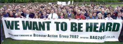 Tony Baldry MP with local residents and a banner reading 'We want to be heard'