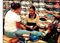 People in a shoe store