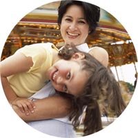 Mother holding child in arms