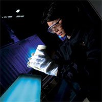 Quality control inspection of autocatalysts at the Johnson Matthey autocatalyst plant in Shanghai, China