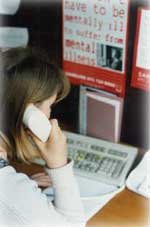 Lady holding phone for SANELINE